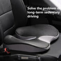Plyzo memory foam lumbar support cushion mounted on an office chair for back pain relief